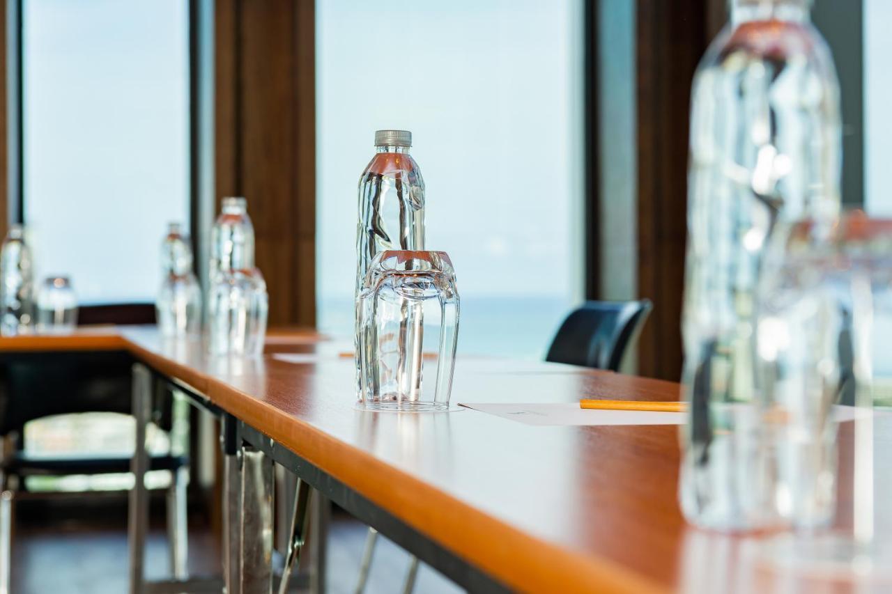 Arbour Hotel And Residence Pattaya Esterno foto Bottled water on a table